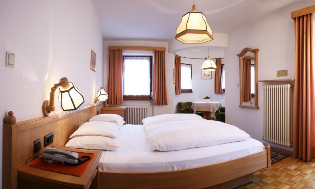Hotel Dolomiti Madonna Ортизей Стая снимка